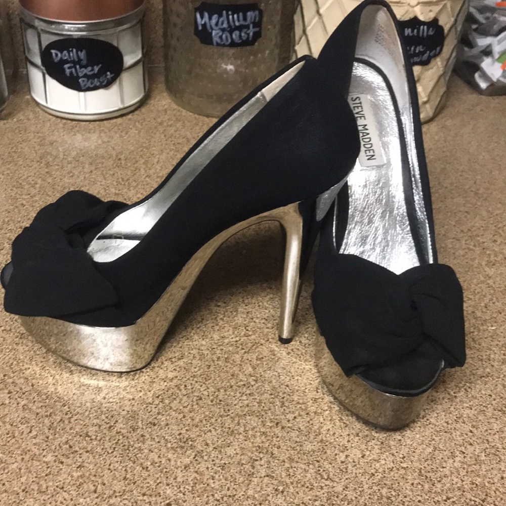 Silver and black platform heels